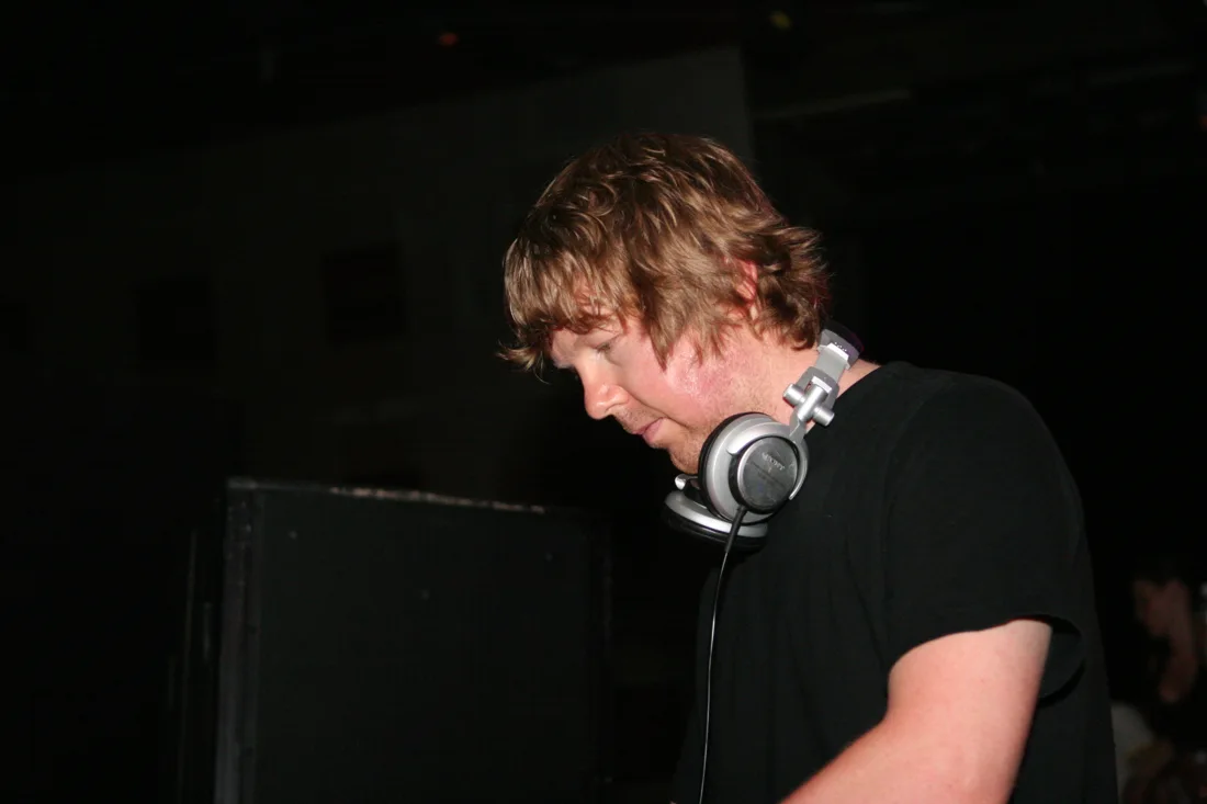 John Digweed DJing in headphones, Toronto, 2006