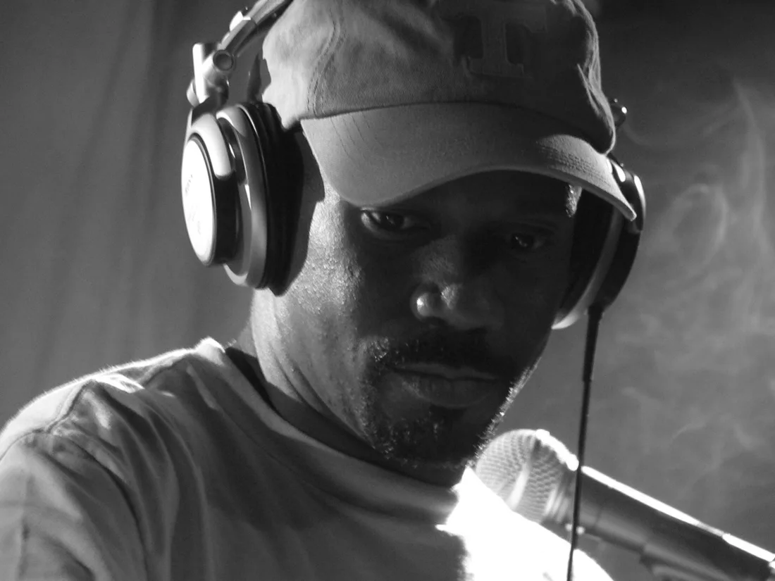 Larry Heard wearing a cap and headphones at J.A.W.
