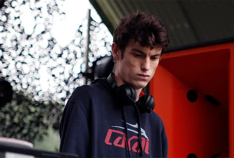 Skee Mask wearing headphones