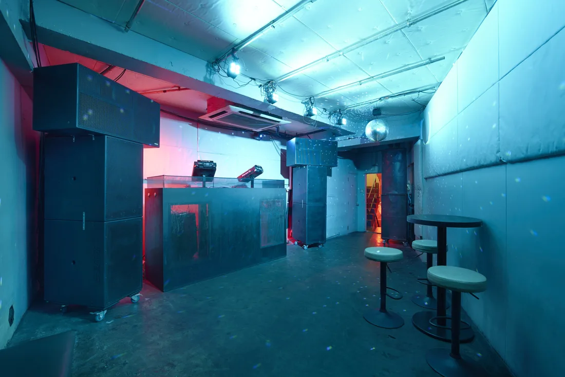 Aoyama Hachi floor with DJ booth, speaker stacks and stools