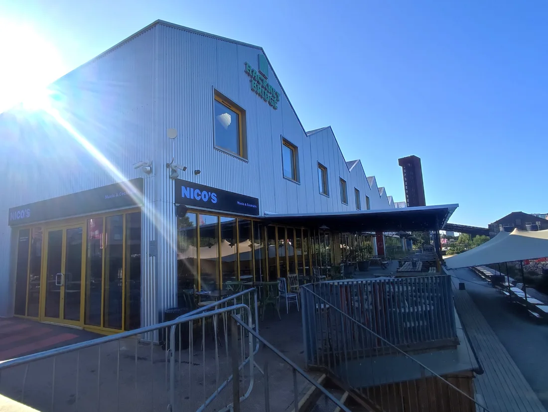 Hackney Bridge corrugated Echo Building with sign, Nico's frontage and canal terrace