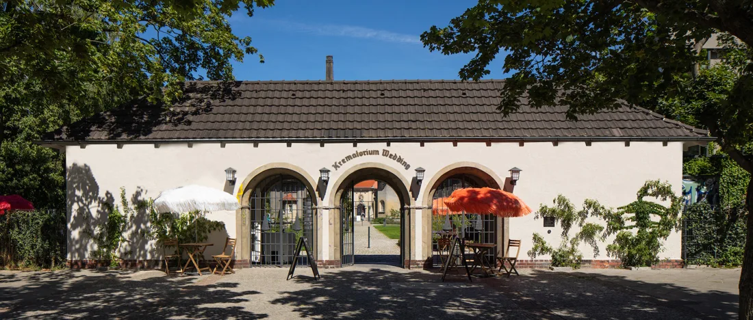 Silent Green gatehouse with Krematorium Wedding lettering and arched gates