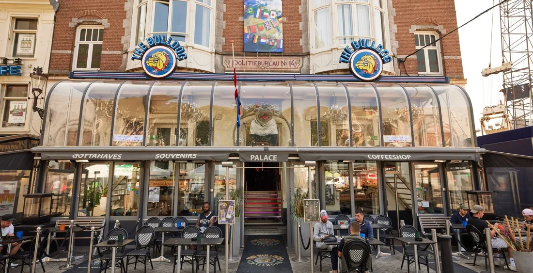 The Bulldog Palace glass-canopied facade and terrace on Leidseplein
