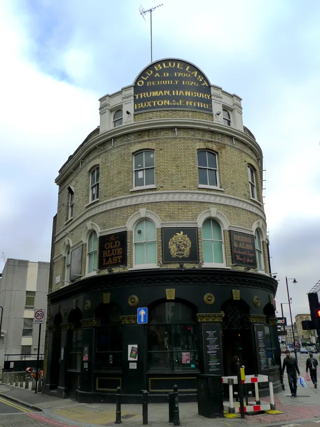 The Old Blue Last curved corner pub exterior with gilded signage