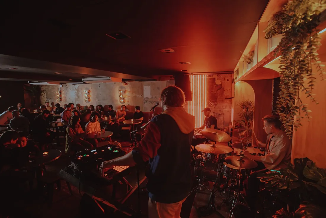 Musicians performing in the warm-lit interior of Wax Music Lounge in Melbourne